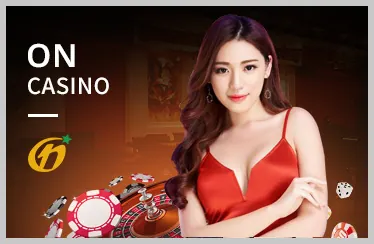 Hình ảnh bàn casino trực tuyến với người chia bài và các lá bài, thể hiện trải nghiệm casino nbet